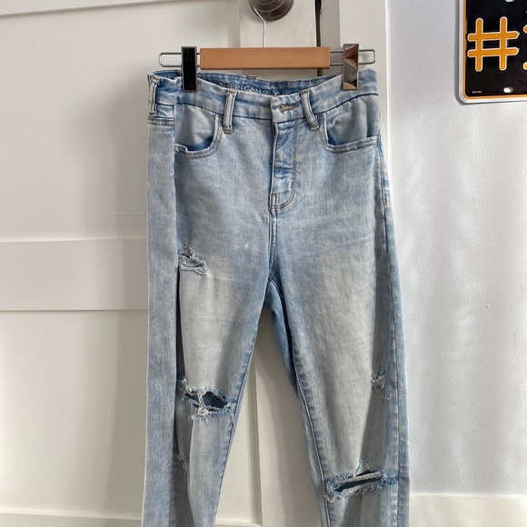 Light Wash Jeans with holes that have fabric underneath - Picture 1 of 5